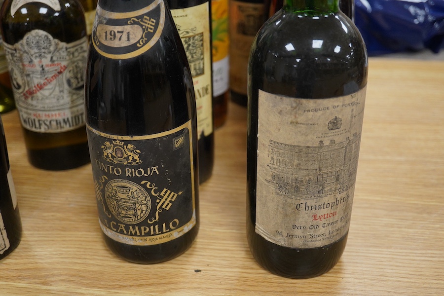 Twenty bottles of spirits, liqueurs and wine, together with some half bottles and miniatures, including; a 1947 Heidsieck & Co. Dry Monopole champagne, a 1983 Chateau Ferrande Bordeaux, two bottles of Herbes Mesclades, a